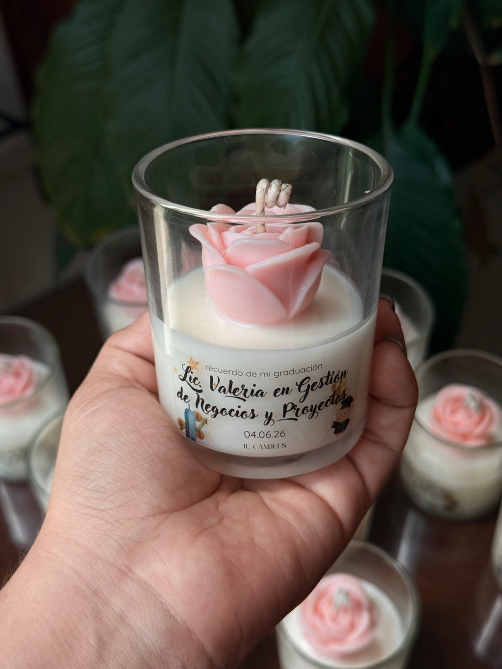 Vela en vaso con rosa