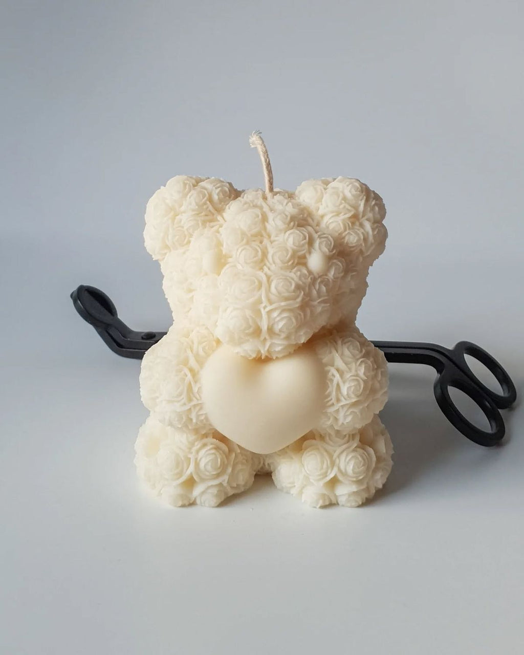 Vela oso con corazón